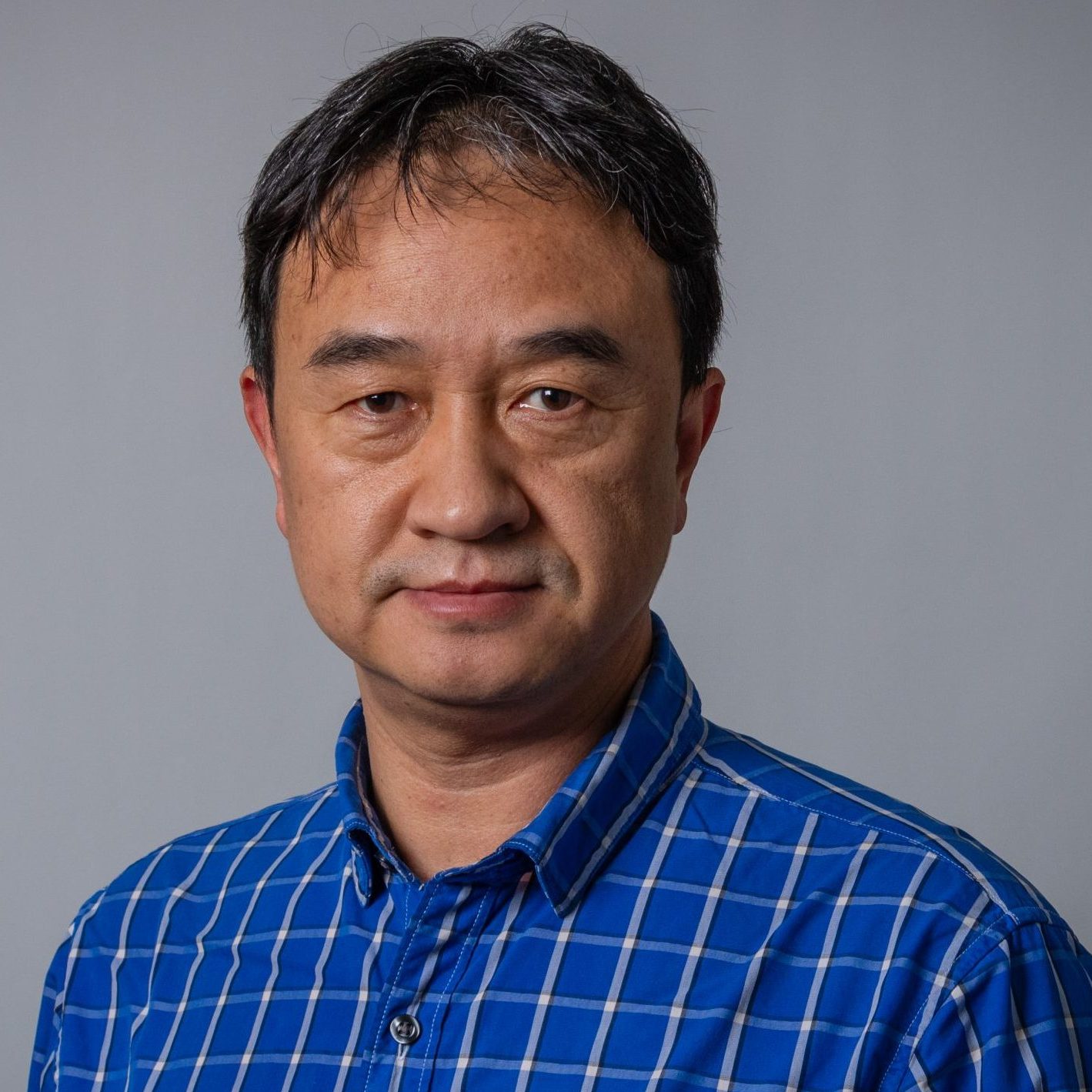 Headshot of Dr. Chengyu Cao.